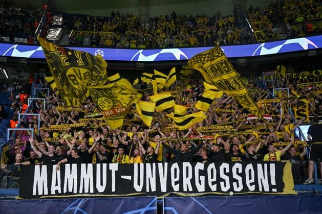 19 09 2023, Football, Champions League, 1 matchday, 2023 2024 season, Paris St Germain Borussia Dortmund, Fans of Borussia Dortmund in the guest block with fan poster Mammut Unforgotten xRHR PHOTO TKx Copyright: RHR-FOTOx RHR-FOTO TK