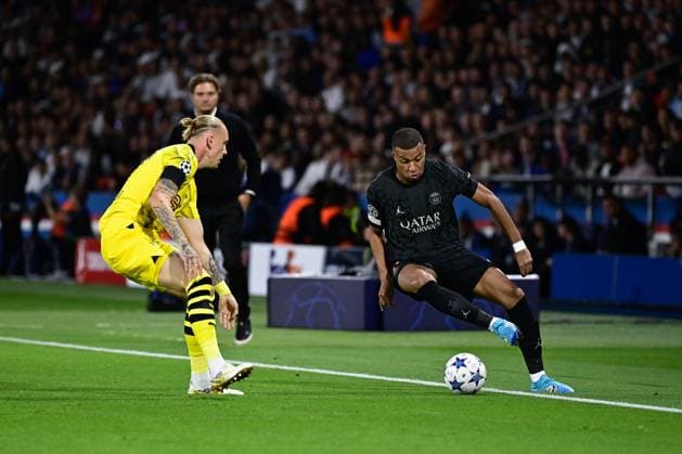 Kylian Mbappe ( 7 - PSG ) - Marius Wolf ( 17 - Borussia Dortmund ) - FOOTBALL : Paris Saint Germain vs Borussia Dortmund - Ligue des Champions - 19 09 2023 FedericoPestellini Panoramic 