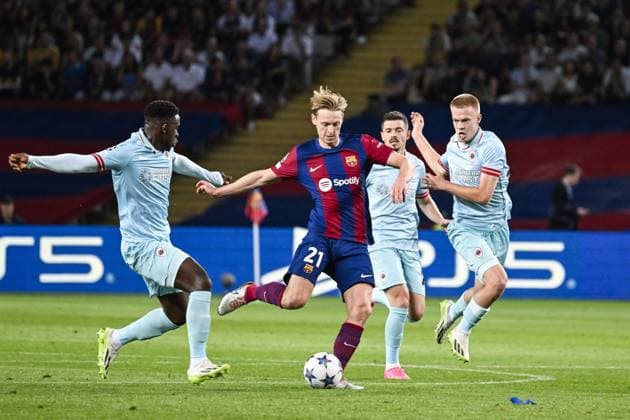 Antwerp s Mandela Keita, Barcelona s Frenkie de Jong and Antwerp s Arthur Vermeeren pictured in action during a soccer game between Spanish FC Barcelona, Barca and Belgian Royal Antwerp FC, on Tuesday 19 September 2023 in Barcelona, Spain, on day 1 of the Champions League group stage, in group H. TOM GOYVAERTS TomxGoyvaerts  x74450663x