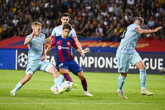 Antwerp s Arthur Vermeeren, Barcelona s Joao Felix and Antwerp s Jelle Bataille pictured in action during a soccer game between Spanish FC Barcelona, Barca and Belgian Royal Antwerp FC, on Tuesday 19 September 2023 in Barcelona, Spain, on day 1 of the Champions League group stage, in group H. TOM GOYVAERTS TomxGoyvaerts  x74450673x