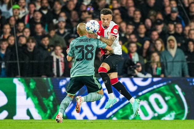UEFA Champions League: Feyenoord v Celtic Rotterdam - Daizen Maeda of Celtic, Quilindschy Hartman of Feyenoord during the 1st leg of the UEFA Champions League between Feyenoord v Celtic at Stadion Feijenoord De Kuip on 19 September 2023 in Rotterdam, The Netherlands. Copyright: xTomxBodex