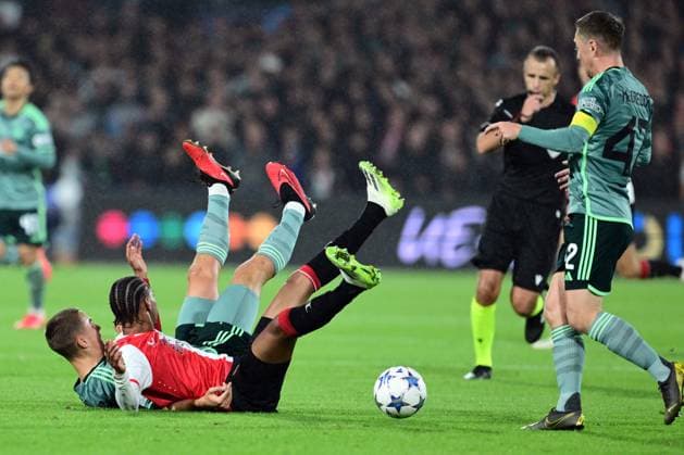 ROTTERDAM - (l-r) Gustaf Lagerbielke of Celtic, Calvin Stengs of Feyenoord during the UEFA Champions League match between Feyenoord and Celtic FC at Feyenoord Stadion de Kuip on September 19, 2023 in Rotterdam, Netherlands. ANP OLAF KRAAK Group E - UEFA Champions League 2023 2024 xVIxANPxSportx xxANPxIVx 478716374 originalFilename: 478716374.jpg