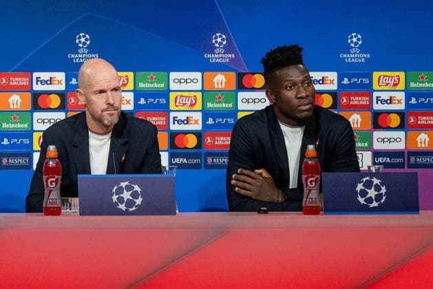 Erik ten Hag Head Coach Head Coach, Manchester United FC and Andre Onana Goalkeeper Goalkeeper, Manchester United FC, 24 listen attentively to a question about GER, press conference before the match FC Bayern Muenchen vs Manchester United FC, football, Championsleague, Season 2023 2024, 19 09 2023 DFL DFB REGULATES PROHIBIT ANY USE OF PHOTOGRAPHS as IMAGE SEQUENCES and or QUASI VIDEO GER, Press conference before the match FC Bayern Muenchen vs Manchester United FC, Football, Championsleague, Season 2023 2024, 19 09 2023 Muenchen Copyright: xEibner-Pressefoto HeikexFeinerx EP_HFR