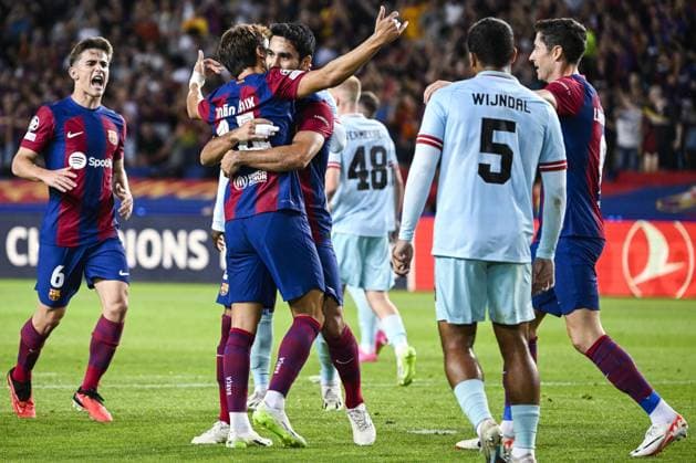 Barcelona s Joao Felix and Barcelona s Ilkay Gundogan celebrate after scoring during a soccer game between Spanish FC Barcelona, Barca and Belgian Royal Antwerp FC, on Tuesday 19 September 2023 in Barcelona, Spain, on day 1 of the Champions League group stage, in group H. TOM GOYVAERTS TomxGoyvaerts  x74472664x