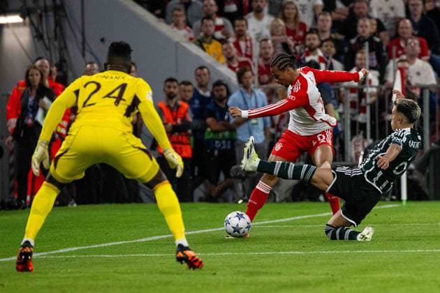 Goalkeeper Andre Onana Manchester United , Leroy Sane FC Bayern Muenchen and Lisandro Martinez Manchester United Germany, Munich, 20 09 2023, Football, UEFA Champions League FC Bayern Muenchen vs Manchester United, Season 2023 2024, Match Day 1, Allianz Arena Foto A2 Bildagentur Peter Hartenfelser