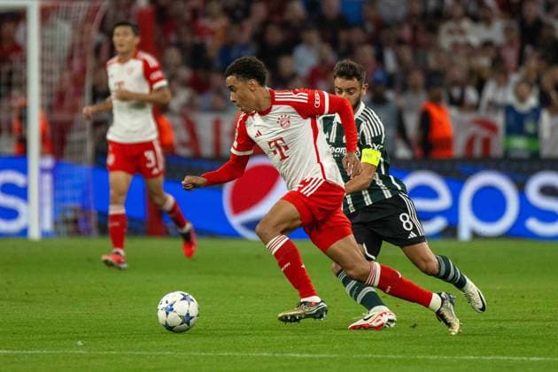 Jamal Musiala FC Bayern Muenchen and Bruno Fernandes Manchester United Germany, Munich, 20 09 2023, football, UEFA Champions League FC Bayern Muenchen vs Manchester United, 2023 2024 season, Match Day 1, Allianz Arena Foto A2 Bildagentur Peter Hartenfelser