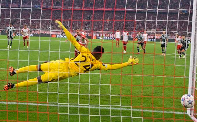 20 09 2023, Football UEFA Championsleague 2023 2024 1 matchday preliminary round, FC Bayern Munich Manchester United, at Allianz Arena Munich Harry Kane FC Bayern Munich scores on penalty kick against goalkeeper Andre Onana Manchester United DFL and DFB regulations prohibit any use of photographs as image sequences and or quasi video