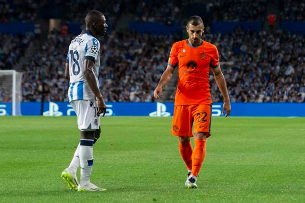 Real Sociedad vs Inter: Group D - UEFA Champions League Henrikh Mkhitaryan of FC Internazionale Milano and Amari Traore of Real Sociedad in action during UEFA Champions League match between Real Sociedad and Inter at Reale Arena. Donostia (Spain). September 20, 2023. (Gari Garaialde Bostok Photo) Donostia Gipuzkoa Spain Editorial Use Only  Copyright: xGarikoitzxGaraialdex Bostok Photo GarixGaraialdex GG2309200173