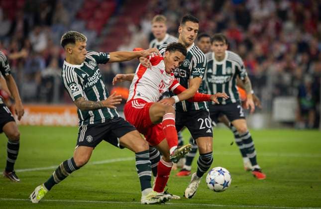 Munic, Germany 20th Sep 2023 Jamal Musiala Munich , Lisandro Martinez ManU , Diego Dalot ManU FC Bayern Munich Manchester United 20 09 2023