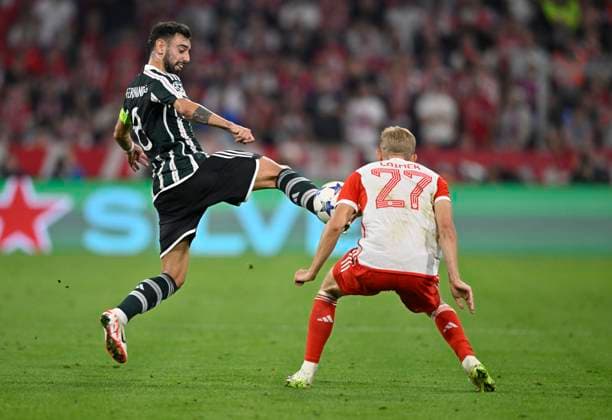 one-on-one heel kick Bruno Fernandes Manchester United ManU 08 vs Konrad Laimer FC Bayern Muenchen FCB 27 FC Bayern Muenchen FCB vs Manchester United ManUnited ManU group stage 20 09 2023 DFL REGULATES PROHIBIT ANY USE OF PHOTOGRAPHS AS IMAGE SEQUENCES AND OR QUASI VIDEO FC Bayern Muenchen FCB vs Manchester United