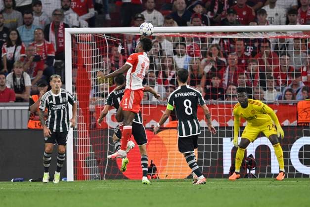 penalty area scene, goal area scene Kingsley Coman FC Bayern Muenchen FCB 11 header goal shot action goal chance against goalkeeper Andre Onana Manchester United ManU 24 FC Bayern Muenchen FCB vs Manchester United ManUnited ManU group stage 20 09 2023 DFL REGULATIONS PROHIBIT ANY USE OF PHOTOGRAPHS AS IMAGE SEQUENCES AND OR QUASI VIDEO FC Bayern Muenchen FCB vs Manchester United