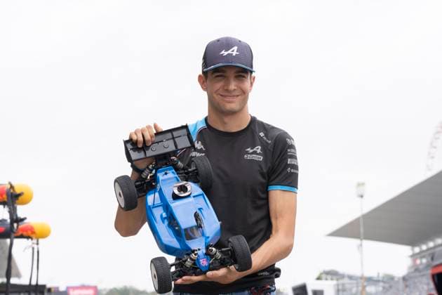 September 21, 2023, Suzuka, Mie Prefecture, Japan: ESTEBAN OCON (FRA) of Alpine 31 races RC cars on the pit road on Preparation Day of the Formula 1 Lenovo Japanese Grand Prix. Suzuka Japan - ZUMAb177 20230921_aap_b177_039 Copyright: xTaidghxBarronx