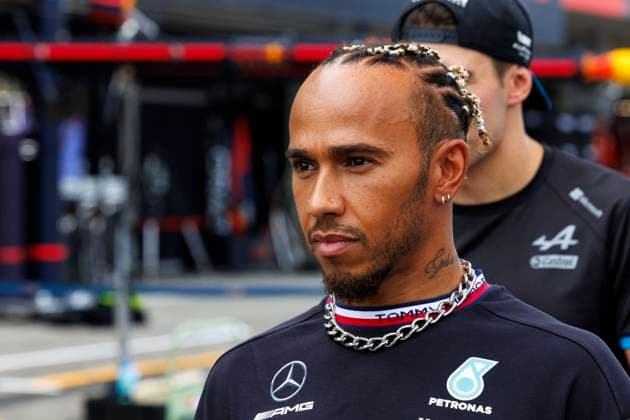 21st September 2023; Suzuka Circuit, Suzuka, Japan; 2023 Formula 1 Lenovo Japanese Grand Prix; Arrival and Inspection Day; Number 44 Mercedes AMG Petronas driver Lewis Hamilton plays with an electric replica car  ActionPlus12555634 StephenxBlackberry