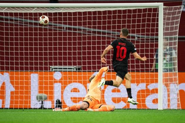 230921 Florian Wirtz of Bayer Leverkusen scores 1 0 behind goalkeeper Peter Abrahamsson of Häcken during the UEFA Europa League football match between Bayer Leverkusen and Häcken on September 21, 2023 in Leverkusen Photo Daniel Stiller BILDBYRAN code DS DS0334 football soccer football uefa europa league bayer leverkusen häcken bbeng  Copyright: DANIELxSTILLER BB230921DS016