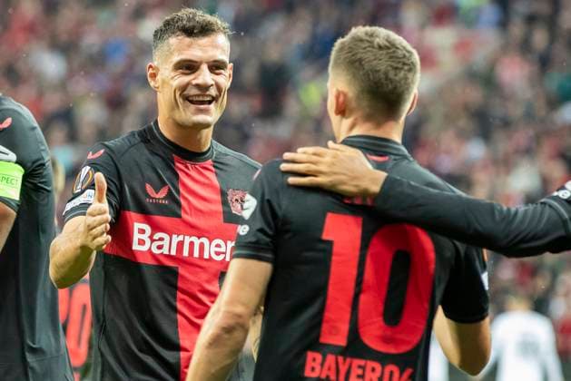 UEFA Europa League, Bayer Leverkusen BK Haecken, 21 09 2023 Granit XHAKA Bayer 04 Leverkusen, 34 congratulates Florian WIRTZ Bayer 04 Leverkusen, 10 on goal, UEFA Europa League, Bayer 04 Leverkusen BK Haecken, 1 group match, on 21 09 2023, BayArena, Leverkusen DFL regulations prohibit any use of photographs as image sequences and or quasi video Copyright: xBEAUTIFULxSPORTS Meuselx