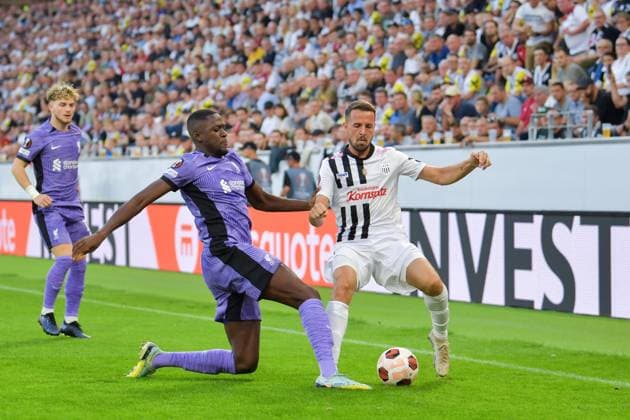 SOCCER - UEFA EL, LASK vs Liverpool LINZ,AUSTRIA,21.SEP.23 - SOCCER - UEFA Europa League, group stage, Linzer ASK vs Liverpool FC. Image shows Ibrahim Konate (Liverpool) and Rene Renner (LASK).  GEPAxpictures xChristianxMoser