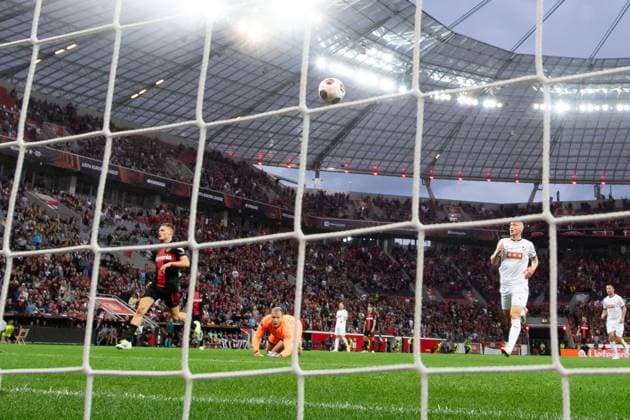 230921 Florian Wirtz of Bayer Leverkusen scores 1 0 behind goalkeeper Peter Abrahamsson of Häcken during the UEFA Europa League football match between Bayer Leverkusen and Häcken on September 21, 2023 in Leverkusen Photo Daniel Stiller BILDBYRAN code DS DS0334 football soccer football uefa europa league bayer leverkusen häcken bbeng depp  Copyright: DANIELxSTILLER BB230921DS021