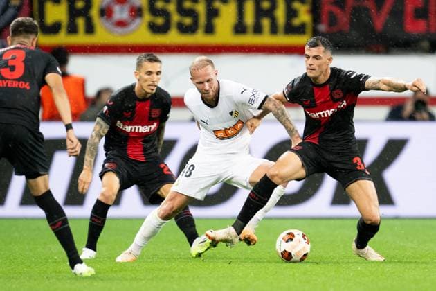 230921 Mikkel Rygaard Jensen of Häcken and Granit Xhaka of Bayer Leverkusen during the UEFA Europa League football match between Bayer Leverkusen and Häcken on September 21, 2023 in Leverkusen Photo Daniel Stiller BILDBYRAN code DS DS0334 football soccer football uefa europa league bayer leverkusen häcken bbeng  Copyright: DANIELxSTILLER BB230921DS027