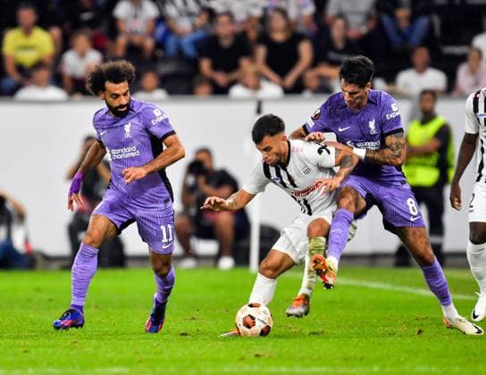 SOCCER - UEFA EL, LASK vs Liverpool LINZ,AUSTRIA,21.SEP.23 - SOCCER - UEFA Europa League, group stage, Linzer ASK vs Liverpool FC. Image shows Mohamed Salah (Liverpool), Sascha Horvath (LASK) and Dominik Szoboszlai (Liverpool).  GEPAxpictures xAvnixRetkoceri