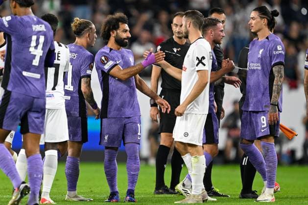 SOCCER - UEFA EL, LASK vs Liverpool LINZ,AUSTRIA,21.SEP.23 - SOCCER - UEFA Europa League, group stage, Linzer ASK vs Liverpool FC. Image shows Mohamed Salah (Liverpool) and Rene Renner (LASK).  GEPAxpictures xDanielxSchoenherr