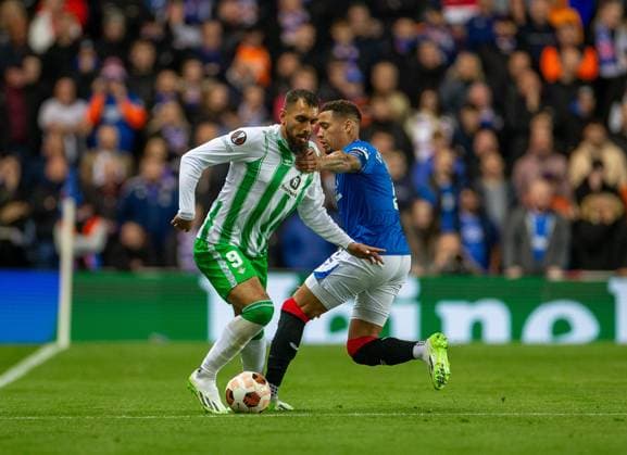 21st September 2023; Ibrox Stadium, Glasgow, Scotland: Europa League, Group Stage Football, Rangers versus Real Betis; James Tavernier of Rangers fouls Borja Iglesias of Real Betis  ActionPlus12555722 VagelisxGeorgariou