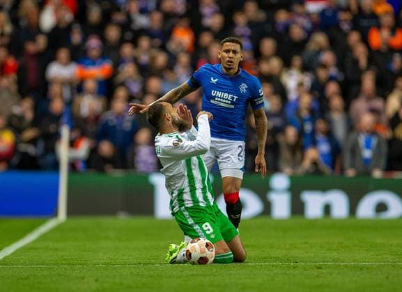 21st September 2023; Ibrox Stadium, Glasgow, Scotland: Europa League, Group Stage Football, Rangers versus Real Betis; James Tavernier of Rangers looks on as Borja Iglesias of Real Betis clutches his face  ActionPlus12555723 VagelisxGeorgariou