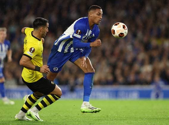 Brighton and Hove, England, 21st September 2023. Sergio Araujo of AEK Athens and Joao Pedro of Brighton and Hove Albion challenge for the ball during the UEFA Europa League match at the AMEX Stadium, Brighton and Hove. Picture credit should read: Paul Terry Sportimage EDITORIAL USE ONLY. No use with unauthorised audio, video, data, fixture lists, club league logos or live services. Online in-match use limited to 120 images, no video emulation. No use in betting, games or single club league player publications. SPI-2581-0010