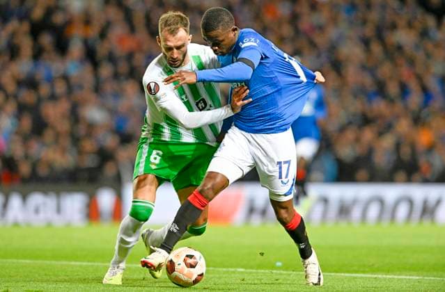 Glasgow, Scotland, 21st September 2023. German Pezzella of Real Betis and Rabbi Matondo of Rangers during the UEFA Europa League match at Ibrox Stadium, Glasgow. Picture credit should read: Neil Hanna Sportimage EDITORIAL USE ONLY. No use with unauthorised audio, video, data, fixture lists, club league logos or live services. Online in-match use limited to 120 images, no video emulation. No use in betting, games or single club league player publications. SPI-2582-0009