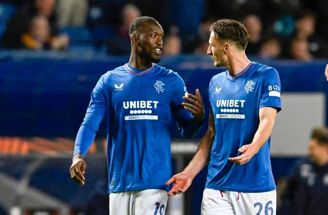 Glasgow, Scotland, 21st September 2023. Who scored? Abdallah Sima and Ben Davies of Rangers debate who scored the winner during the UEFA Europa League match at Ibrox Stadium, Glasgow. Picture credit should read: Neil Hanna Sportimage EDITORIAL USE ONLY. No use with unauthorised audio, video, data, fixture lists, club league logos or live services. Online in-match use limited to 120 images, no video emulation. No use in betting, games or single club league player publications. SPI-2582-0012