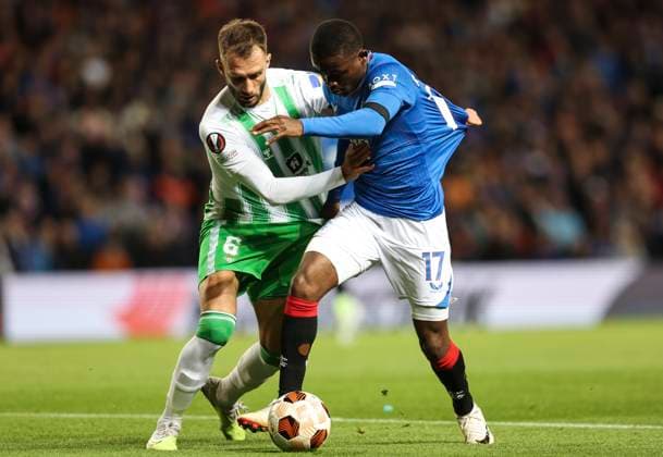 Football - 2023 2024 UEFA Europa League - Group C - Glasgow Rangers vs Real Betis - Ibrox Stadium - Thursday 21st September 2023 Rabbi Matondo of Rangers vies with Victor Ruiz of Real Betis 