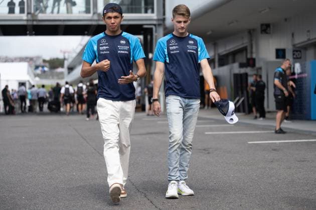September 22, 2023, Suzuka, Mie Prefecture, Japan: ALEXANDER ALBON (THA) of Williams 23 and LOGAN SARGEANT (USA) of Williams 2 arrives to the paddock on Practice Day at the Formula 1 Japanese Grand Prix. Suzuka Japan - ZUMAb177 20230922_aap_b177_020 Copyright: xTaidghxBarronx