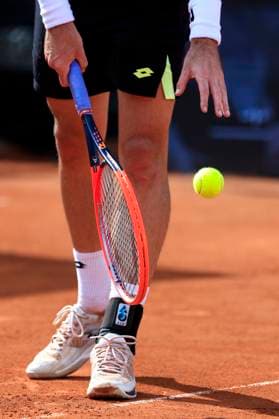 TENNIS - ATP, Tennis Herren Layjet Open BAD WALTERSDORF,AUSTRIA,22.SEP.23 - TENNIS - ATP Challenger Tour, Layjet Open. Image shows a feature with the tennis racket and a ball of Dennis Novak (AUT).  GEPAxpictures xMarioxBuehner-Weinrauch