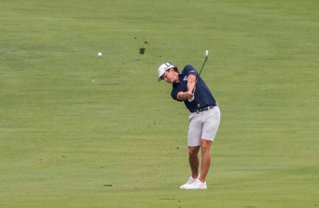 James Piot of the US hits his approach shot on the fourteenth hole during the first round of the 2023 LIV Golf League tournament at Rich Harvest Farms in Sugar Grove, Illinois, on Friday September 22, 2023. Tournament play runs from September 22nd through the 24th.  SGI20230922803 TANNENxMAURY