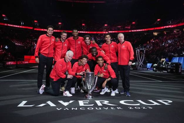 September 24, 2023, VANCOUVER, BC, CANADA: Team World poses with the Laver Cup after defeating Team Europe 13-2 at the Laver Cup tennis tournament, in Vancouver, on Sunday, September 24, 2023. Pictured in the back row from left to right are; Milos Raonic, Tommy Paul, Christopher Eubanks, Taylor Fritz, Francisco Cerundolo and vice captain Patrick McEnroe and front from left to right; captain John McEnroe, Ben Shelton, Frances Tiafoe and Felix Auger-Aliassime. Canada News - September 24, 2023  - ZUMAc35_ 20230924_zaf_c35_024 Copyright: xDarrylxDyckx