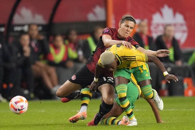 September 26, 2023, Toronto, ON, CANADA: Canada s Christine Sinclair, 12, and Jamaica s Deneisha Blackwood, 14, battle for the ball during second half CONCACAF women s championship soccer series match in Toronto on Tuesday Sept. 26, 2023. Canada News - September 26, 2023 - ZUMAc35_ 20230926_zaf_c35_146 Copyright: xNathanxDenettex