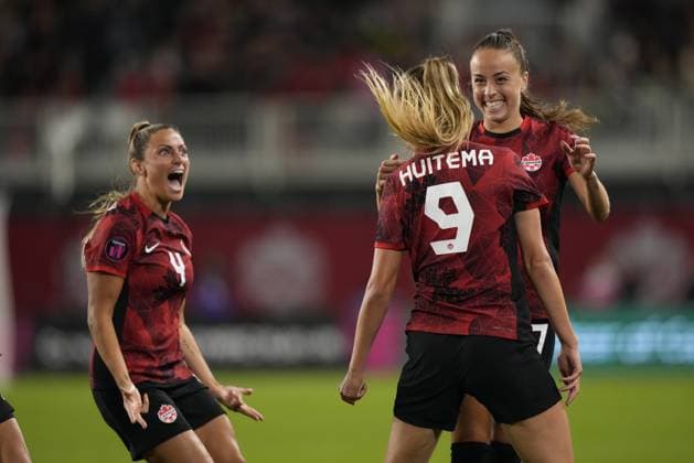 September 26, 2023, Toronto, ON, CANADA: Canada s Jordyn Huitema, 9, celebrates her goal with teammates Julia Grosso, right, and Shelina Zadorshy, 4, during second half CONCACAF women s championship soccer series match against Jamaica in Toronto on Tuesday Sept. 26, 2023. Canada News - September 26, 2023 - ZUMAc35_ 20230926_zaf_c35_171 Copyright: xNathanxDenettex