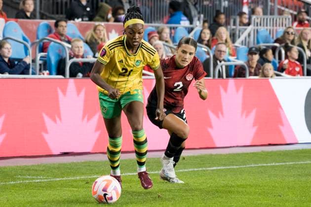 September 26, 2023, Toronto, Ontario, Canada: Sydney Collins 2 (R) and Cheyna Williams 21 (L) in action during the CONCACAF Women s Championship 2024 Olympic qualifier between Canada and Jamaica at BMO field in Toronto. The game ended 2-1 for Canada sending it to the Paris 2024 Olympic Games, Olympische Spiele, Olympia, OS Toronto Canada - ZUMAm154 20230926_zap_m154_048 Copyright: xAngelxMarchinix