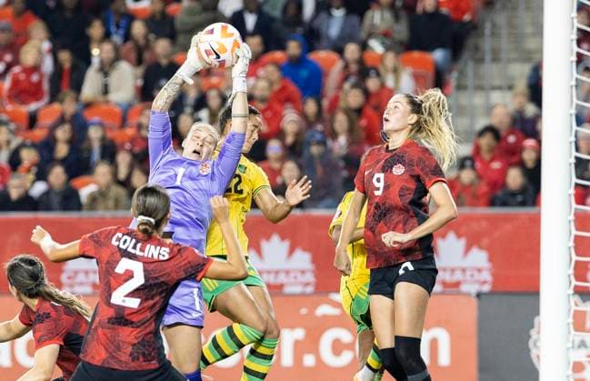 (230927) -- TORONTO, Sept. 27, 2023 -- Goalkeeper Kailen Sheridan (3rd L) of Canada saves the ball during the Play-In series second leg match of the CONCACAF Women s Olympic Qualifying between Canada and Jamaica at BMO Field in Toronto, Canada, on Sept. 26, 2023. Canada women s national soccer team advanced to the Paris 2024 Olympic Games, Olympische Spiele, Olympia, OS on Tuesday. (Photo by Xinhua) (SP)CANADA-TORONTO-SOCCER-CONCACAF WOMEN S OLYMPIC QUALIFYING-PLAY-IN SERIES ZouxZheng 
