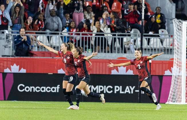 (230927) -- TORONTO, Sept. 27, 2023 -- Players of Canada celebrate after scoring during the Play-In series second leg match of the CONCACAF Women s Olympic Qualifying between Canada and Jamaica at BMO Field in Toronto, Canada, on Sept. 26, 2023. Canada women s national soccer team advanced to the Paris 2024 Olympic Games, Olympische Spiele, Olympia, OS on Tuesday. (Photo by Xinhua) (SP)CANADA-TORONTO-SOCCER-CONCACAF WOMEN S OLYMPIC QUALIFYING-PLAY-IN SERIES ZouxZheng 