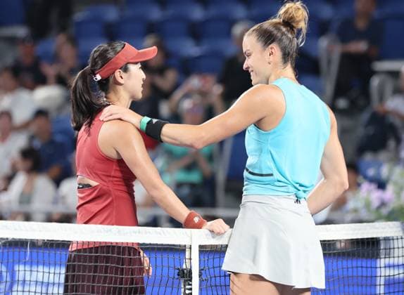 September 28, 2023, Tokyo, Japan - Misaki Doi of Japan (L) hugs with Maria Sakkari (R) of Greece after their game at the second round match of the Toray pan Pacific Open tennis tournament at the Ariake Colosseum in Tokyo on Thursday, September 28, 2023. Doi was defeated by Sakkari 3-6, 1-6 and withdrew from her professional carrier. (photo by Yoshio Tsunoda AFLO) Noxthirdxpartyxsales  (0306207811st)