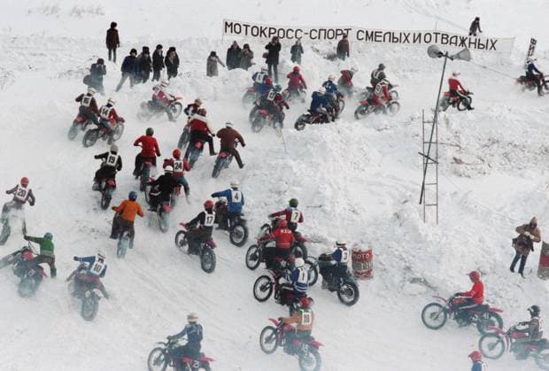Moscow, USSR. Participants and spectators of the motorbike cross race for the prize of the newspaper Vechernyaya Moskva are pictured at one of the distance sections in the Kolomenskoye Museum-Reserve. Valery Zufarov TASS  18909452