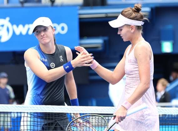 September 29, 2023, Tokyo, Japan - Veronika Kudermetova of Russia (R) shakes hands with Iga Swiatek of Poland (L) after she defeated the world s second ranked Swiatek during the quarter final match of the Toray pan Pacific Open tennis tournament at the Ariake Colosseum in Tokyo on Friday, September 29, 2023. (photo by Yoshio Tsunoda AFLO) Noxthirdxpartyxsales  (0306318787st)