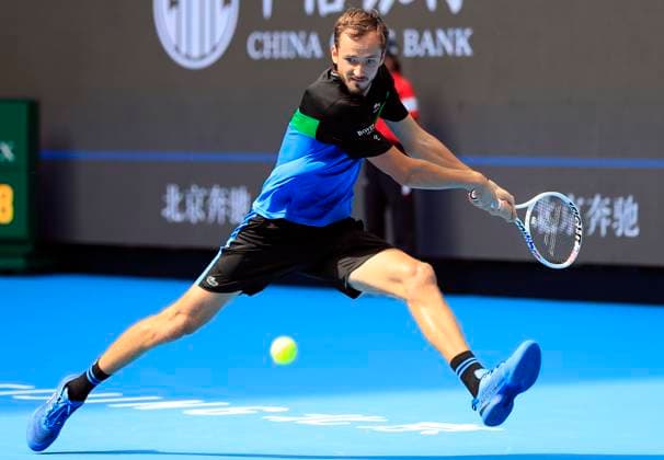 (230929) -- BEIJING, Sept. 29, 2023 -- Daniil Medvedev hits a return to Tommy Paul of the United States during the men s singles first round match at 2023 China Open tennis tournament in Beijing, capital of China, Sept. 29, 2023. ) (SP)CHINA-BEIJING-TENNIS-CHINA OPEN-MEN S SINGLES-1ST ROUND(CN) LuoxYuan 