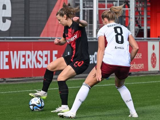 Kerstin Bogenschuetz 1 FC Nuernberg, 08 tries to interfere Synne Skinnes Hansen Bayer 04 Leverkusen, 10 while receiving the ball Bayer 04 Leverkusen vs 1 FC Nuernberg, Football, Google Pixel Womens Bundesliga, 02 Matchday, Season 2023 2024, 30 09 2023 DFL REGULATES PROHIBIT ANY USE OF PHOTOGRAPHS AS IMAGE SEQUENCES AND OR QUASI VIDEO Bayer 04 Leverkusen vs 1 FC Nuernberg, Football, Google Pixel Womens Bundesliga, 02 Matchday, Season 2023 2024, 30 09 2023 Leverkusen Copyright: xEibner-Pressefoto ThomasxHaeslerx EP_THR
