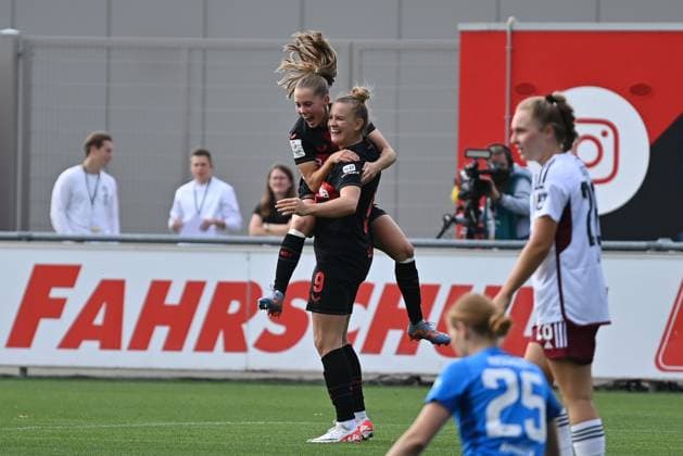 Jubel, Freuen, celebrate, happy, cheer , Goal Celebration Janou Levels B04 , 5 mit Torschützin Nikola Karczewska B04, 9 , 30 09 2023, Leverkusen Germany , Fussball,google pixel Frauenbundesliga bayer 04 Leverkusen 1 FC Nürnberg, DFB DFL REGULATIONS PROHIBIT ANY USE OF PHOTOGRAPHS AS IMAGE SEQUENCES AND OR QUASI VIDEO xmkx