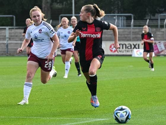 Janou Levels Bayer 04 Leverkusen, 05 , pursued by Madeleine Steck 1 FC Nuernberg, 28 , looks for a face-off in the middle Bayer 04 Leverkusen vs 1 FC Nuernberg, Football, Google Pixel Womens Bundesliga, 02 Matchday, Season 2023 2024, 30 09 2023 DFL REGULATES PROHIBIT ANY USE OF PHOTOGRAPHS AS IMAGE SEQUENCES AND OR QUASI VIDEO Bayer 04 Leverkusen vs 1 FC Nuernberg, Football, Google Pixel Womens Bundesliga, 02 Matchday, Season 2023 2024, 30 09 2023 Leverkusen. Copyright: xEibner-Pressefoto ThomasxHaeslerx EP_THR
