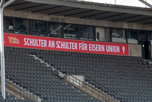 Football, men, season 2023 2024, Champions League Group C, 2 matchday , 1 FC Union Berlin SC Braga, 1 day before the game, the Olympic Stadium is wrapped in the red and white club colors of Union, in the picture banner with quote from the Union anthem, 02 10 2023, Copyright: xSebastianxRäppold MatthiasxKochx