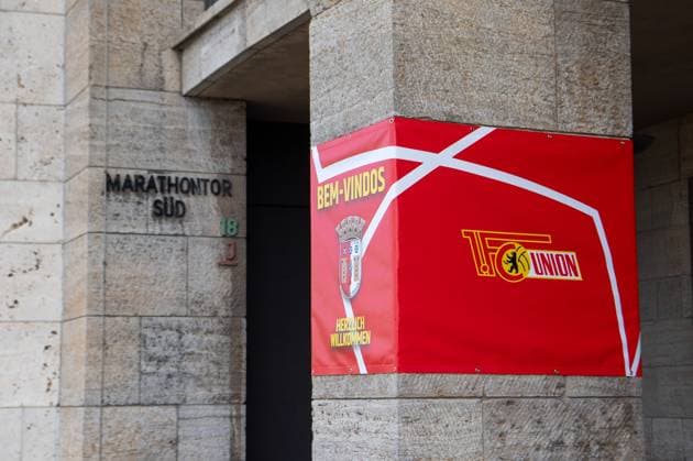 Football, men, season 2023 2024, Champions League Group C, 2 match day , 1 FC Union Berlin SC Braga, 1 day before the game, the Olympic Stadium is wrapped in the red and white club colors of Union, in the picture posters to welcome the fans from Braga, 02 10 2023, Copyright: xSebastianxRäppold MatthiasxKochx