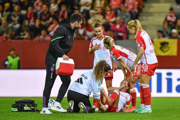 Lina Magull 16 FC Bayern , Lea Schüller 11 Bayern and Glodis Viggosdottir 4 FC Bayern worry about Sydney Lohmann lying on the ground 12 FC Bayern at Google Pixel womens Bundesliga match FC Bayern Munich 1 FC Cologne on 02 10 2023 Munich FC Bayern Campus Bayern Germany