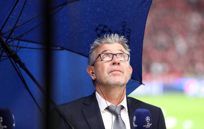 Coach Urs Fischer with umbrella during interview Sport Football Soccer UEFA Champions League UCL Men 2 Matchday Season 2023 2024 03 10 2023 1 FC Union Berlin FCU vs SC Braga Olympiastadion DFL regulations prohibit any use of photographs as image sequences and or quasi video